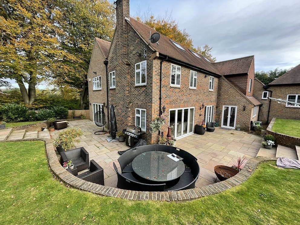 View of the patio and property prior to design and build commencing.