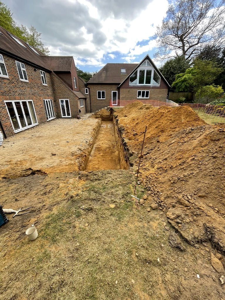 Construction of the rear garden terraces.